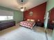 Comfortable main bedroom with a ceiling fan, dual closets, soft carpet, and a large window for ample light at 2598 Fountain Ave, Pahrump, NV 89048