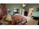 View of a main bedroom with a closet and ensuite bathroom, offering comfort and convenience at 2598 Fountain Ave, Pahrump, NV 89048