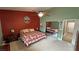 Spacious main bedroom features vaulted ceilings, closet access, and views of an ensuite bathroom at 2598 Fountain Ave, Pahrump, NV 89048