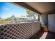 A cozy balcony offers views of the complex's lush landscaping and architecture at 2606 S Durango Dr # 122, Las Vegas, NV 89117