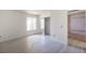 Bright bedroom featuring light floors, closet, and window at 2606 S Durango Dr # 122, Las Vegas, NV 89117