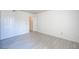 Bright bedroom with closet space and white walls, light floors at 2606 S Durango Dr # 122, Las Vegas, NV 89117