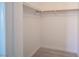 Walk-in closet featuring rod and wood-look flooring at 2606 S Durango Dr # 122, Las Vegas, NV 89117