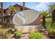 Welcome to Symphony. Beautiful community sign surrounded by lush landscaping at 2606 S Durango Dr # 122, Las Vegas, NV 89117