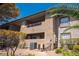 Exterior shot of a condo building showcasing the architecture and desert landscape at 2606 S Durango Dr # 122, Las Vegas, NV 89117
