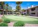 Beautiful green space and landscaping surrounded by residential buildings in this complex at 2606 S Durango Dr # 122, Las Vegas, NV 89117