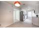 White kitchen with stainless steel refrigerator and updated cabinets at 2606 S Durango Dr # 122, Las Vegas, NV 89117
