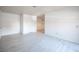 Spacious living area featuring new floors and fresh neutral paint at 2606 S Durango Dr # 122, Las Vegas, NV 89117