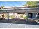 Designated parking area with covered spaces and well-maintained landscaping at 2606 S Durango Dr # 122, Las Vegas, NV 89117