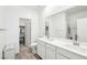Modern bathroom featuring dual sinks, sleek cabinetry, and neutral flooring at 267 Cordelia Cove Ave # 812, Henderson, NV 89011