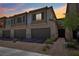Charming home with well-maintained landscaping, inviting walkway, and attached garages at 267 Cordelia Cove Ave # 812, Henderson, NV 89011