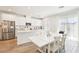 Bright kitchen featuring stainless steel appliances and a large island with dining space at 267 Cordelia Cove Ave # 812, Henderson, NV 89011