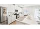 Modern kitchen featuring white cabinets, quartz countertops, and stainless steel appliances at 267 Cordelia Cove Ave # 812, Henderson, NV 89011