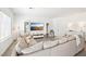 Bright living room featuring a large sectional sofa and entertainment center at 267 Cordelia Cove Ave # 812, Henderson, NV 89011