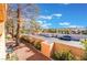 Scenic balcony view with mature tree, showcasing a peaceful street and well-maintained landscape in a sunny setting at 2851 S Valley View Blvd # 2148, Las Vegas, NV 89102
