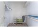 Walk-in closet with shelving, storage containers, and hanging clothes at 2851 S Valley View Blvd # 2148, Las Vegas, NV 89102