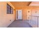 Condo entrance featuring textured walls, overhead lighting, and numbered door, providing a warm welcome at 2851 S Valley View Blvd # 2148, Las Vegas, NV 89102