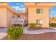 Exterior of condo featuring well-maintained landscaping and walkway on a sunny day at 2851 S Valley View Blvd # 2148, Las Vegas, NV 89102