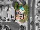 Bird's eye view of backyard featuring a pool, desert landscape, solar panels, and covered patio at 2940 Cimini Ct, Henderson, NV 89052