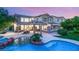 Stunning backyard featuring a pool, patio, and outdoor seating area perfect for entertaining in a two story home at 2940 Cimini Ct, Henderson, NV 89052