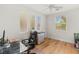 Bright bedroom with a ceiling fan and windows offers natural light and comfortable space at 2940 Cimini Ct, Henderson, NV 89052