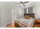 Bedroom with ensuite bathroom, a ceiling fan and natural light at 2940 Cimini Ct, Henderson, NV 89052