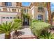 Inviting front entrance with lush landscaping and walkway leading to the front door at 2940 Cimini Ct, Henderson, NV 89052