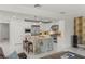 Gourmet kitchen featuring a stainless steel appliances, large island with seating, and an open floor plan at 2940 Cimini Ct, Henderson, NV 89052