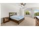 Bright and airy main bedroom with windows that offer serene views of the outdoors at 2940 Cimini Ct, Henderson, NV 89052
