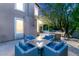 Inviting outdoor seating area with a fire pit, perfect for cozy evenings and gatherings at 2940 Cimini Ct, Henderson, NV 89052