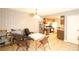 Bright dining area featuring a view to the kitchen, adjacent seating, and ample space at 3008 Saint George St # B, North Las Vegas, NV 89030