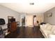 Bright living room featuring hardwood flooring, comfortable seating, and abundant natural light at 3008 Saint George St # B, North Las Vegas, NV 89030