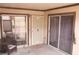 Cozy patio space with a comfortable chair and table, ideal for relaxing outdoors at 3008 Saint George St # B, North Las Vegas, NV 89030
