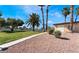 Enjoy tennis courts with palm trees under a bright blue sky at 3008 Saint George St # B, North Las Vegas, NV 89030