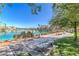 Picturesque lakeside park with benches, lush greenery, and tranquil water views at 3104 Waterview Dr, Las Vegas, NV 89117