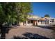 View of the backyard featuring a patio and desert landscaping under a blue sky at 3105 Birch Hill Ct, Las Vegas, NV 89134