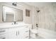 Bathroom features tiled shower, black hardware, and white vanity with framed mirror at 3105 Birch Hill Ct, Las Vegas, NV 89134
