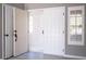 View of front door with screen door and sidelight with shutters at 3105 Birch Hill Ct, Las Vegas, NV 89134