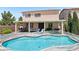 This home features a large pool, spa, covered patio, outdoor kitchen and beautifully landscaped yard at 3194 Lapis Beach Dr, Las Vegas, NV 89117