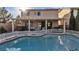 Backyard pool with attached spa and covered patio, perfect for outdoor entertaining at 3194 Lapis Beach Dr, Las Vegas, NV 89117