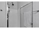 Clean bathroom with a walk-in shower and tiled walls at 3194 Lapis Beach Dr, Las Vegas, NV 89117