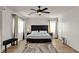 Bright bedroom featuring a king bed, modern furnishings, and natural light at 3194 Lapis Beach Dr, Las Vegas, NV 89117