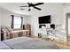 This spacious bedroom is furnished with a comfortable daybed and convenient home office setup at 3194 Lapis Beach Dr, Las Vegas, NV 89117