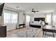 Spacious main bedroom with natural light, wood floors, and modern furnishings at 3194 Lapis Beach Dr, Las Vegas, NV 89117