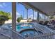 Beautiful pool with spa, surrounded by a white fence and covered patio area at 3194 Lapis Beach Dr, Las Vegas, NV 89117
