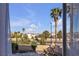 Street view of palm trees and desert landscape from a window at 3194 Lapis Beach Dr, Las Vegas, NV 89117
