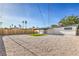 Backyard features a grass patch and white gravel at 333 Rossmoyne Ave, North Las Vegas, NV 89030