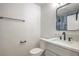 Modern bathroom features a sleek vanity, updated fixtures, and a pristine, efficient toilet at 333 Rossmoyne Ave, North Las Vegas, NV 89030