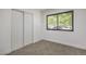 This well-lit bedroom includes a large closet and an exterior view from its big window at 333 Rossmoyne Ave, North Las Vegas, NV 89030