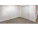 Bedroom with carpet and closet with double sliding doors at 333 Rossmoyne Ave, North Las Vegas, NV 89030